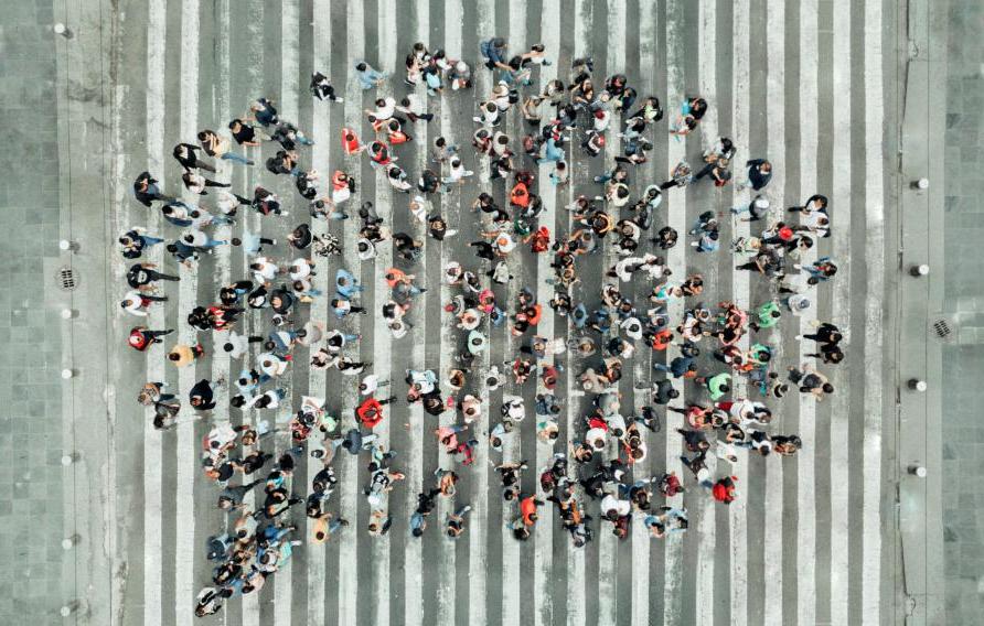 arial view of a thought bubble shaped from people standing in a group