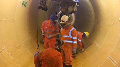 Team in PPE gear working inside tunnel - Doha South Sewage Infrastructure Programme